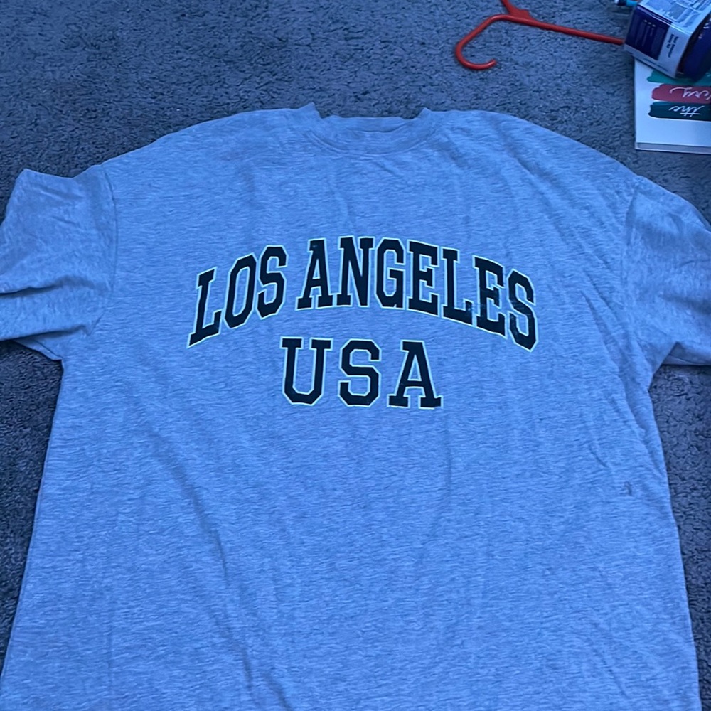 Size M. Oversized, great to throw over a bathing suite!